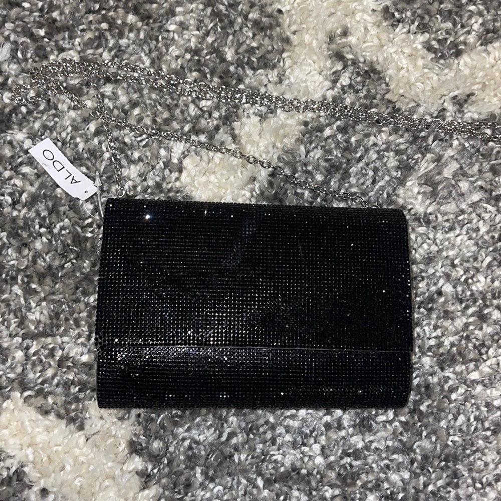 Aldo black rhinestone crossbody with silver chain.